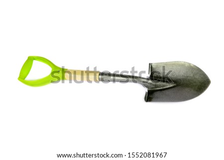 Small camp shovel with handle isolated on white background.