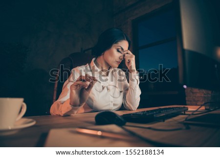 Portrait of her she nice attractive exhausted lady economist auditor attorney lawyer top executive manager completing difficult task deadline at night dark work place station indoors