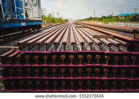 Stock Photo - Light Rail Steel.Pattern of new railway steels