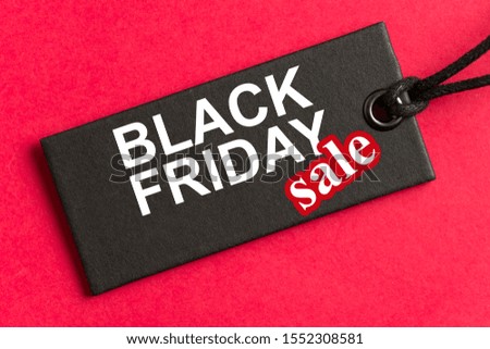 Black Friday sale tag in red background
