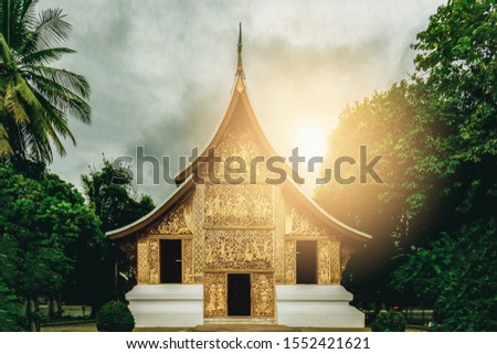 Wat Xieng Thong (Golden City Temple) in Luang Prabang, Laos. Xieng Thong temple is one of the most important of Lao monasteries.Vintage backlit photos