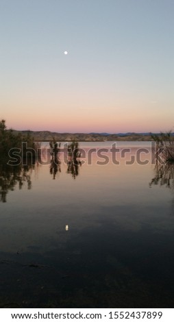 Moon reflecting of Flaming Gorge lake