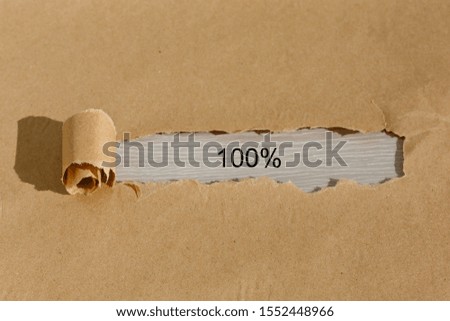 Torn paper box with word 100% on background