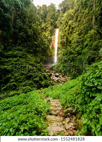 curug seribu waterfall at bogor, indonesia