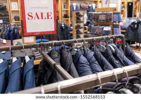 Shopping sale background. Sale sign in a men's clothing store.