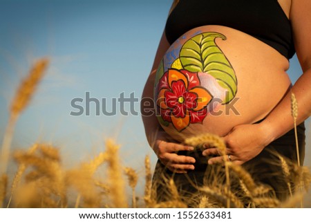 Pregnant woman belly photo shoot