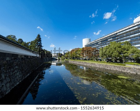 
Tokyo. A moat and office building around the Imperial Palace.