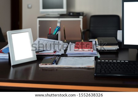 blank photo frame on office desk