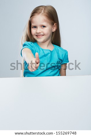 Girl child with white board. Isolated portrait.Thumb up.  Kid.
