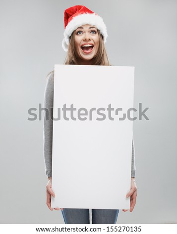 Woman christmas portrait hold white banner. Santa Christmas hat. Isolated portrait.