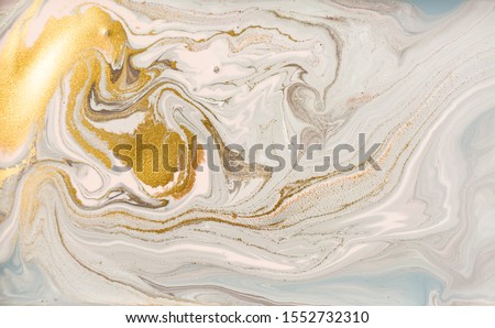 Pastel marble pattern with golden glitter. Abstract liquid background Royalty-Free Stock Photo #1552732310