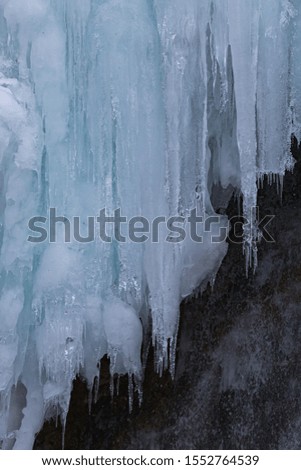 
Detail of a frozen waterfall in winter