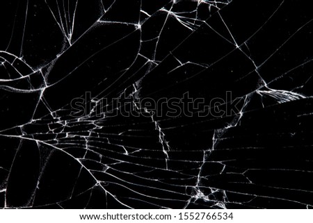 cracked glass isolated on a black 