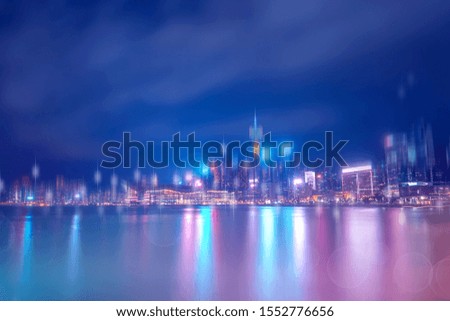Abstract colorful circular bokeh with city background. Double exposure