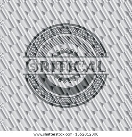 Critical silver emblem. Scales pattern. Vector Illustration. Detailed.