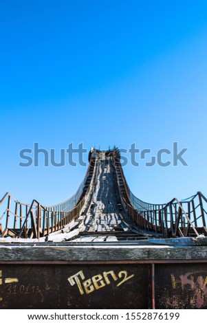 Abandoned springboard near Lake Okunovoy in Murmansk Royalty-Free Stock Photo #1552876199