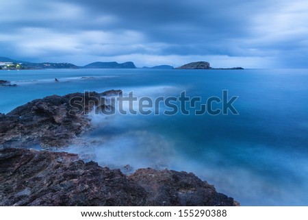Twilight landscape over beautiful rocky coastline in Mediterranean Sea