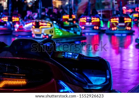 bumper cars on a funfair Royalty-Free Stock Photo #1552926623
