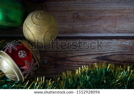 Various Christmas decorations on a wooden table