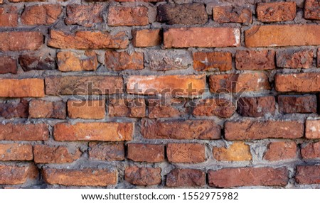 Old vintage light red and brown brick material texture retro wall background