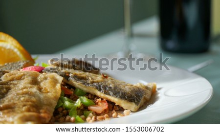 Grilled fish with vegetable and wheat 