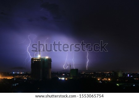 lightning strike building at night