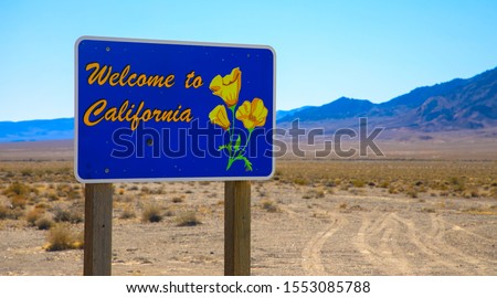 Welcome to California road sign Royalty-Free Stock Photo #1553085788