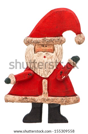 Antique wooden hand made toy Santa Claus isolated on white background