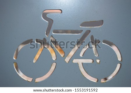 Bicycle sign carved on a metal sheet