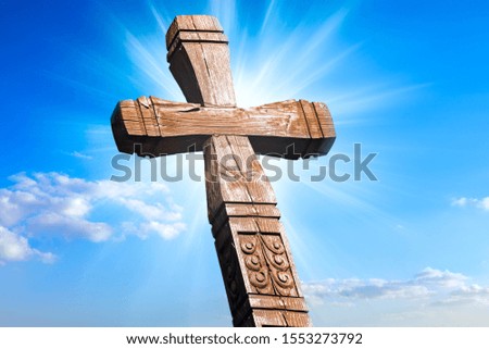A wooden cross with sky . Christian cross against the sky