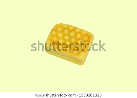 Closeup Picture of Small Traditional Asian Pineapple Cake Bar Isolated on Yellow Background