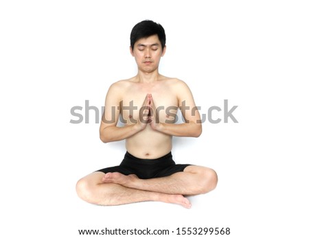 Young man sat and meditated and practiced yoga isolated on white background 