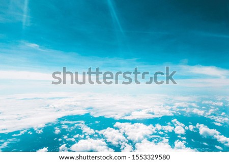 Beautiful aerial photo shot of the cloudscape, the clear blue sky above the clouds of the stratosphere gave out a heavenly and mesmerizing aesthetic 