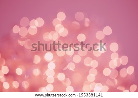 Background bokeh of colorful lights for use as illustrations in art and design.Abstract bokeh background. Christmas Glittering background. Blurred background with bookeh Royalty-Free Stock Photo #1553381141