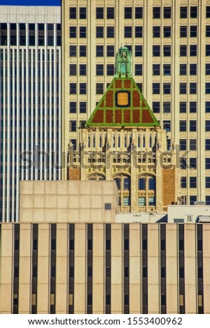 The tops of new and old buildings crowded together in downtown Tulsa OK