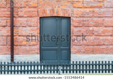 front door in an old brick building