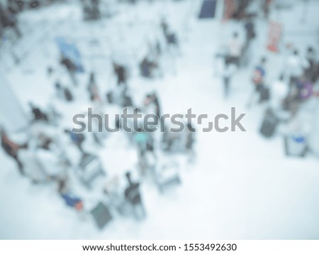 Blur background of terminal airport with people walking. on top view.transportation concept.