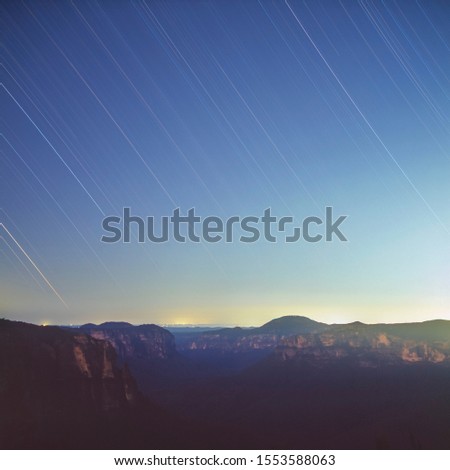 Film star trails over the valley