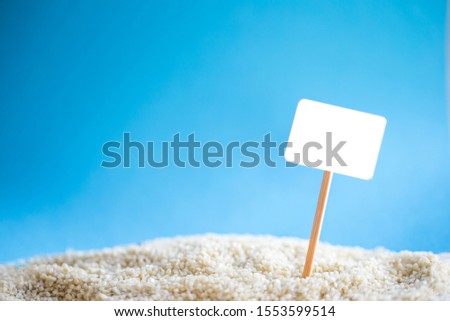 Billboard blank on tropical  sand beach for outdoor advertising poster for summer vacation concept.