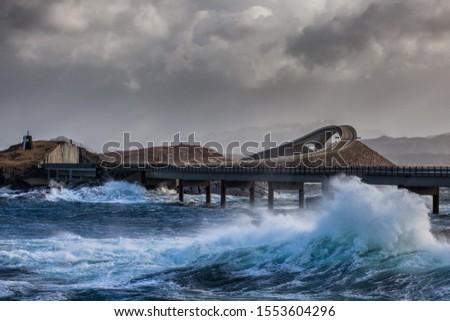 a stormy day at the atlantic ocean road between molde and kristiansund.  Royalty-Free Stock Photo #1553604296
