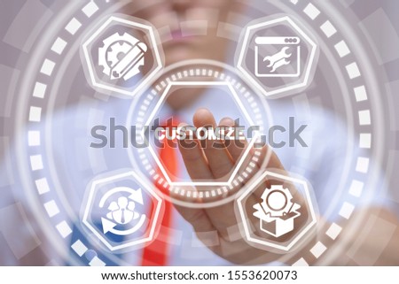 Businessman uses virtual touchscreen and touches word: customize. Customization product business concept. Royalty-Free Stock Photo #1553620073