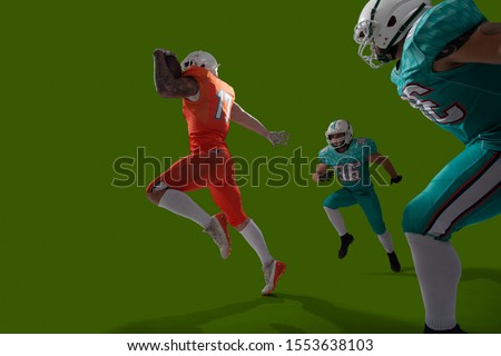 American football players isolated on green screen.
