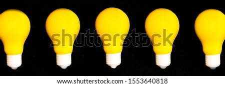 Yellow lighting lamp, isolated on white background, energy concept, idea and creativity