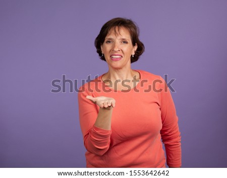 Woman signing thank you using American Sign Language. Hearing impared concept.
