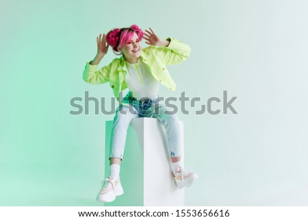 young cheerful woman in beautiful clothes
