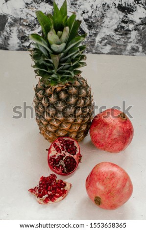 tropical fruits lie on a white background