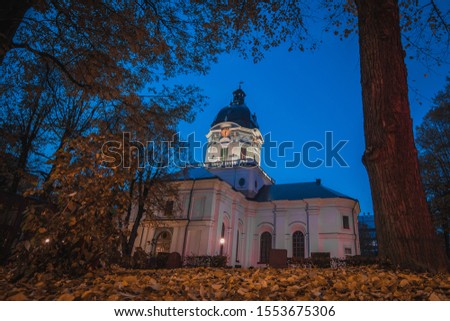 Adolf Fredrik church in Stockholm, photo taken in blue hour at night, during a beautiful autumn setting. Low profile picture of Adolf Fredrik church