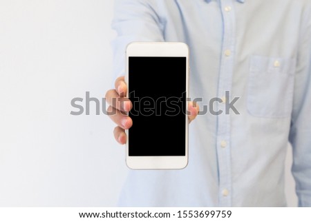 businessman showing phone screen mockup