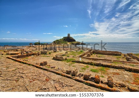 Archaeological site of Nora and Torre del Coltellazzo, Sardinia, Italy Royalty-Free Stock Photo #1553707376