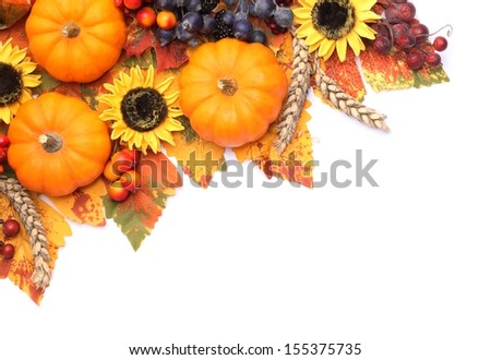 Pumpkins and colorful autumn decorations on white background.